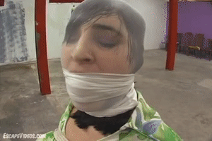 escapevideos.com - Charlotte Ball Gag Hood Fondle 2 thumbnail